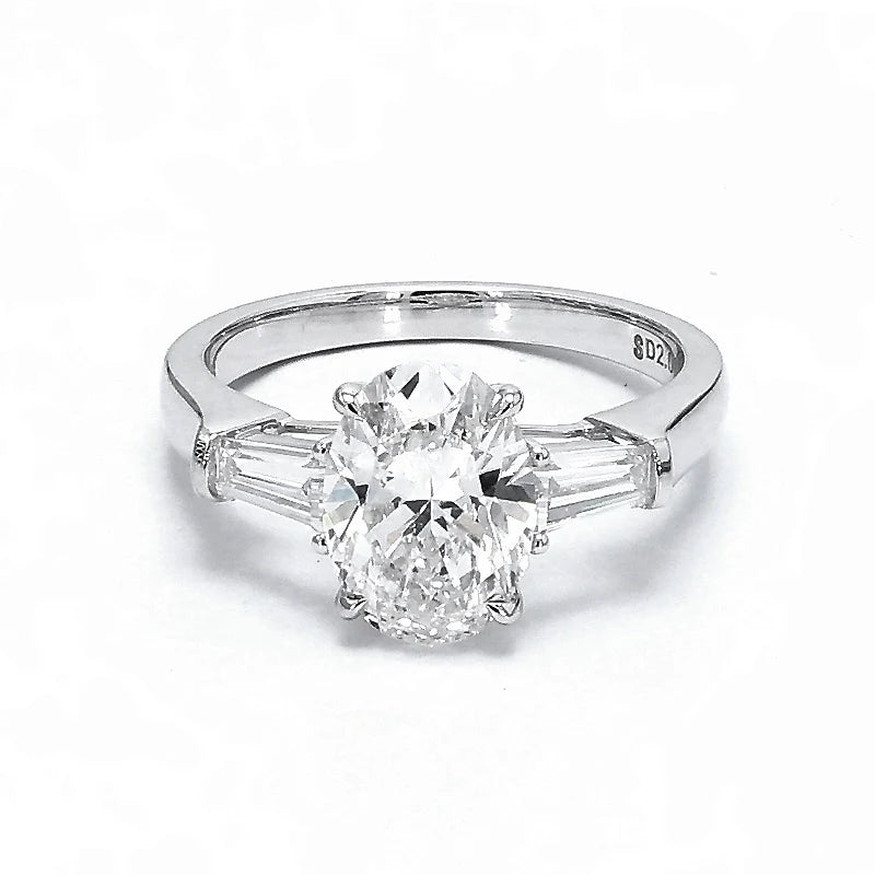 Oval Three-Stone Engagement Ring with Tapered Baguettes (2 CT)