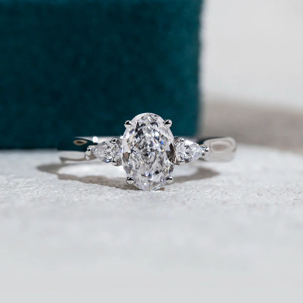 Oval Engagement Ring with Pear-Shaped Side Stones (1.5 CT)
