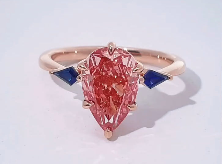 Pear Cut Pink Diamond Ring with Kite-Cut Sapphires (2.7 CT)