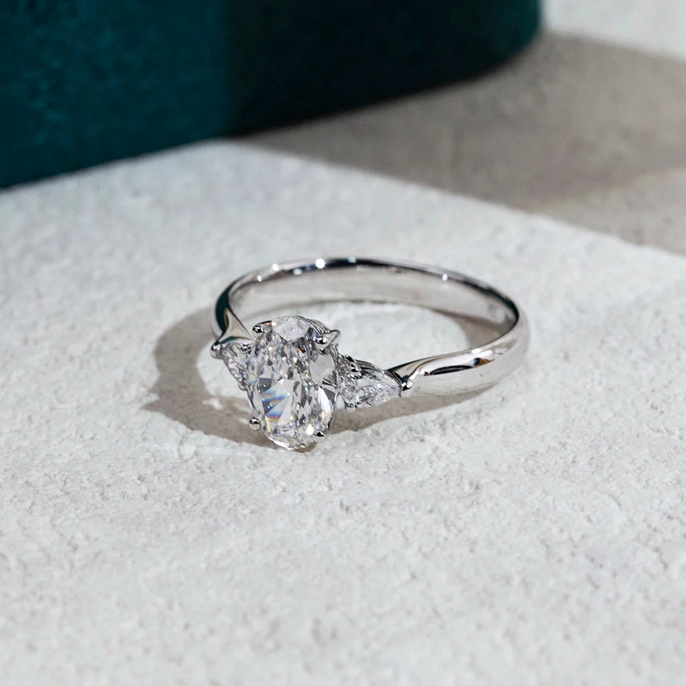 Oval Engagement Ring with Pear-Shaped Side Stones (1.5 CT)