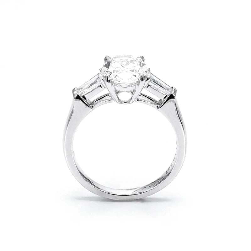 Oval Three-Stone Engagement Ring with Tapered Baguettes (2 CT)
