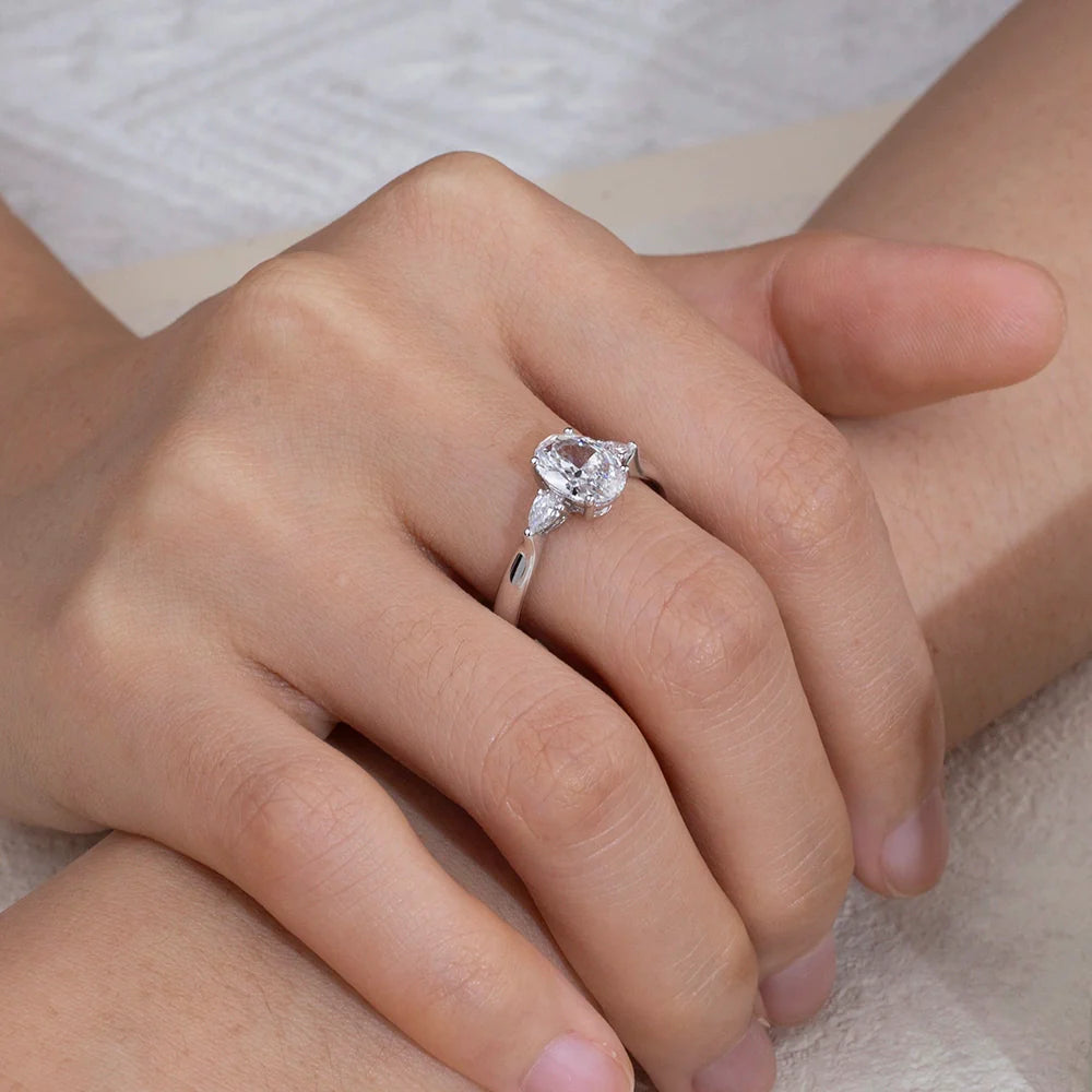 Oval Engagement Ring with Pear-Shaped Side Stones (1.5 CT)