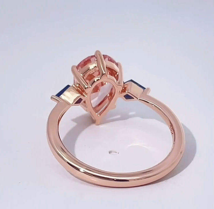 Pear Cut Pink Diamond Ring with Kite-Cut Sapphires (2.7 CT)