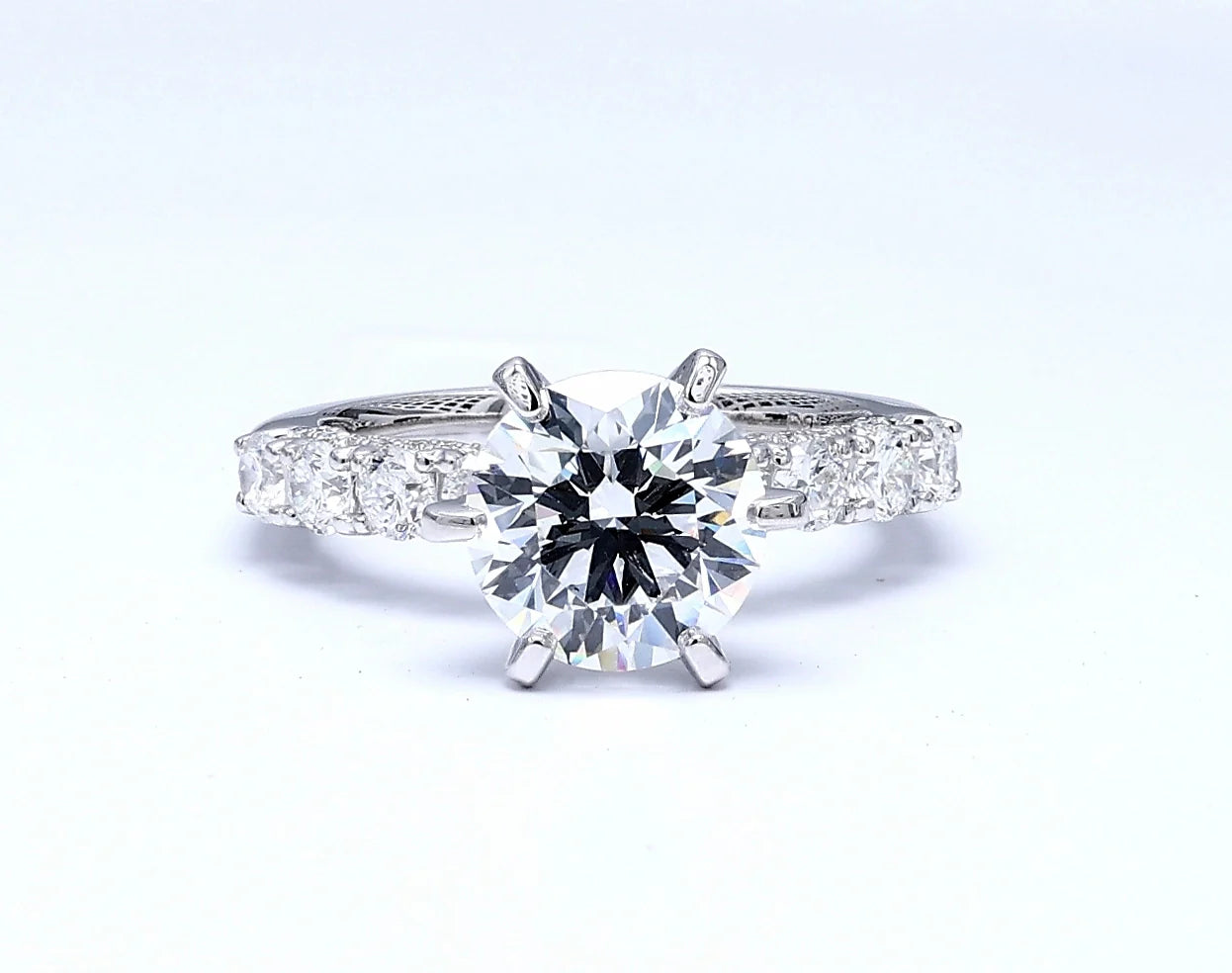 Round Solitaire Ring with Hidden Halo & Graduated Band