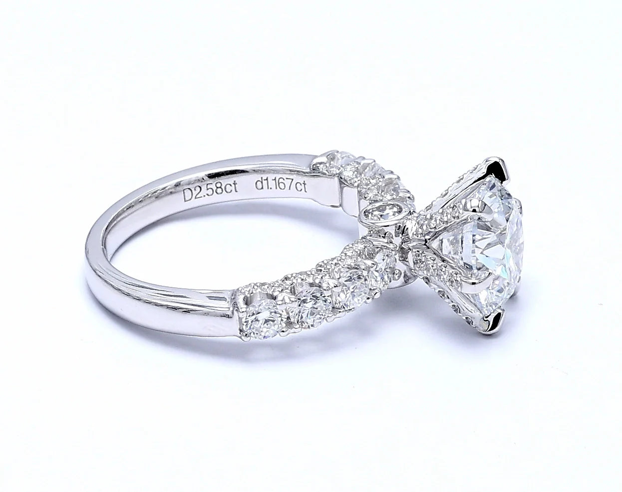 Round Solitaire Ring with Hidden Halo & Graduated Band