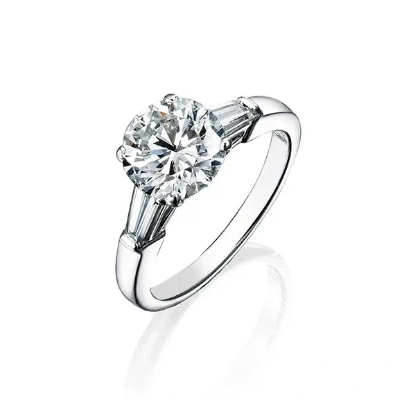 Three-Stone Ring with Round Diamond and Tapered Baguettes (1 CT)