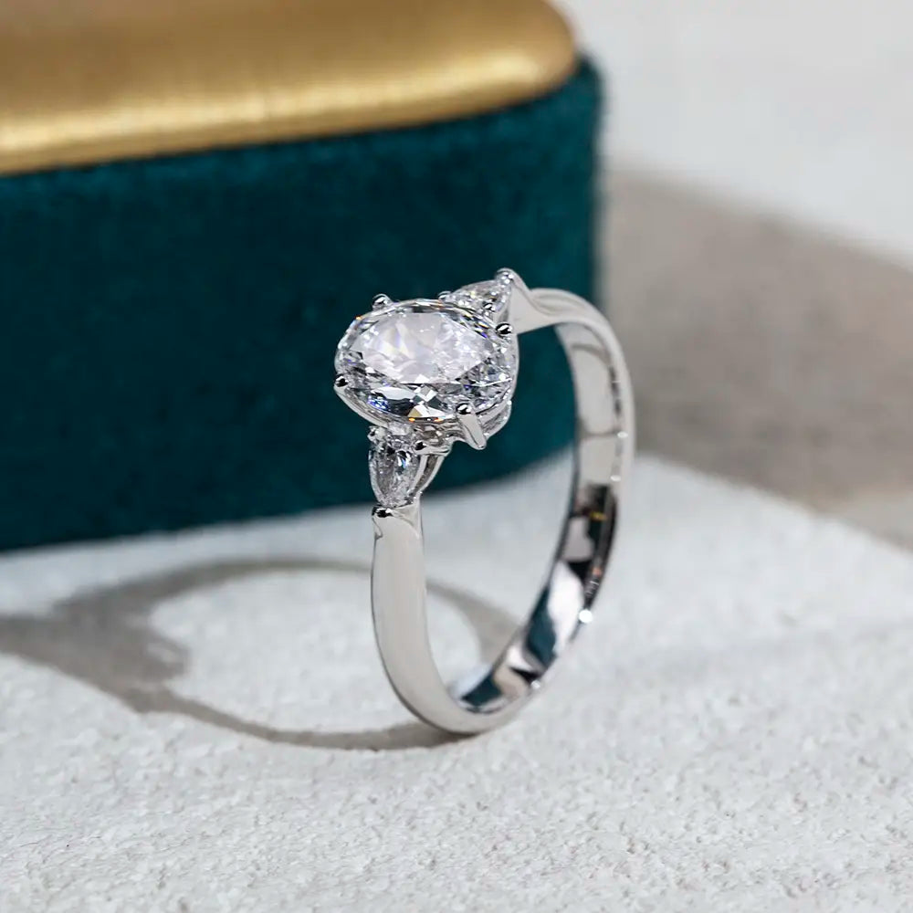 Oval Engagement Ring with Pear-Shaped Side Stones (1.5 CT)