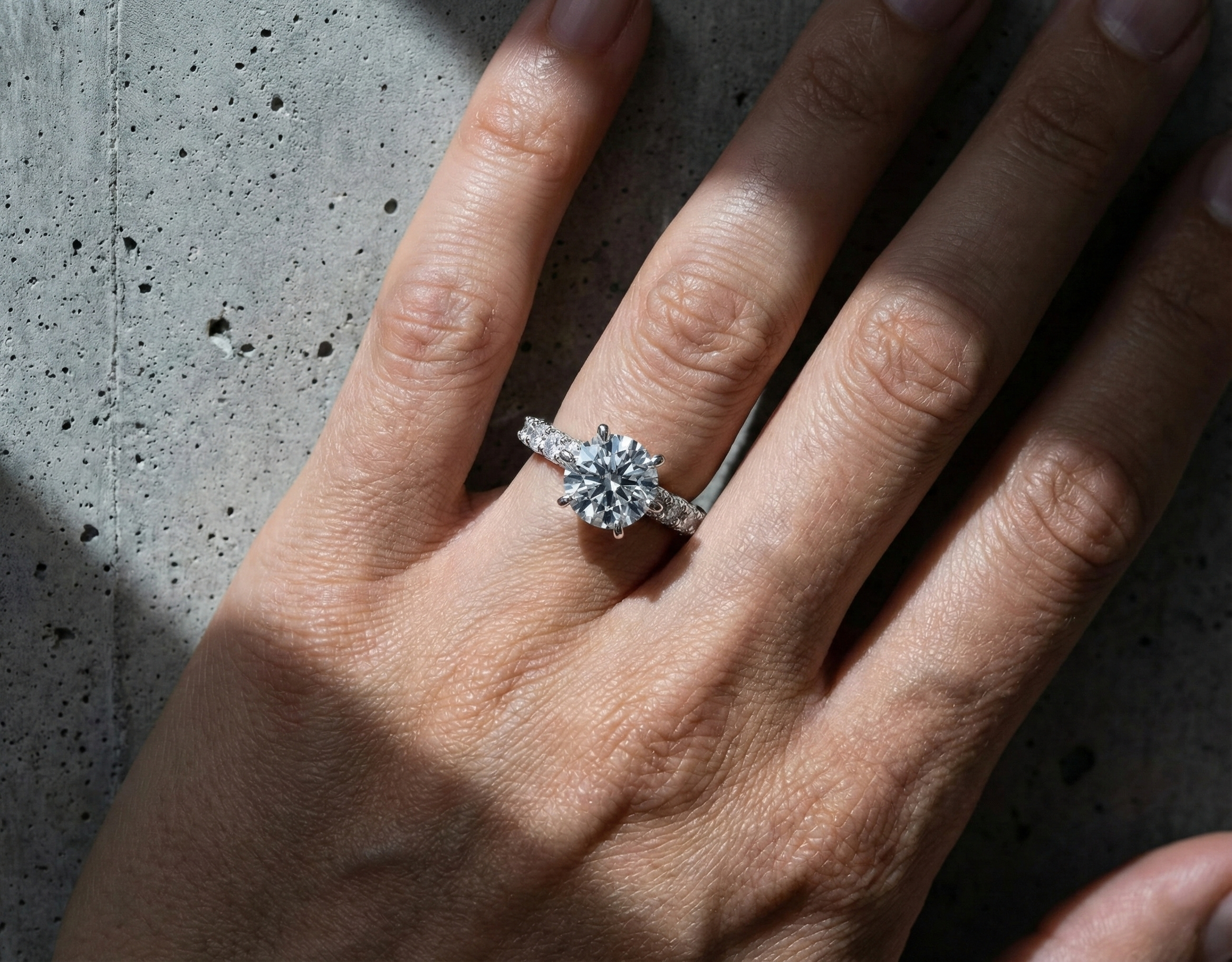 Round Solitaire Ring with Hidden Halo & Graduated Band