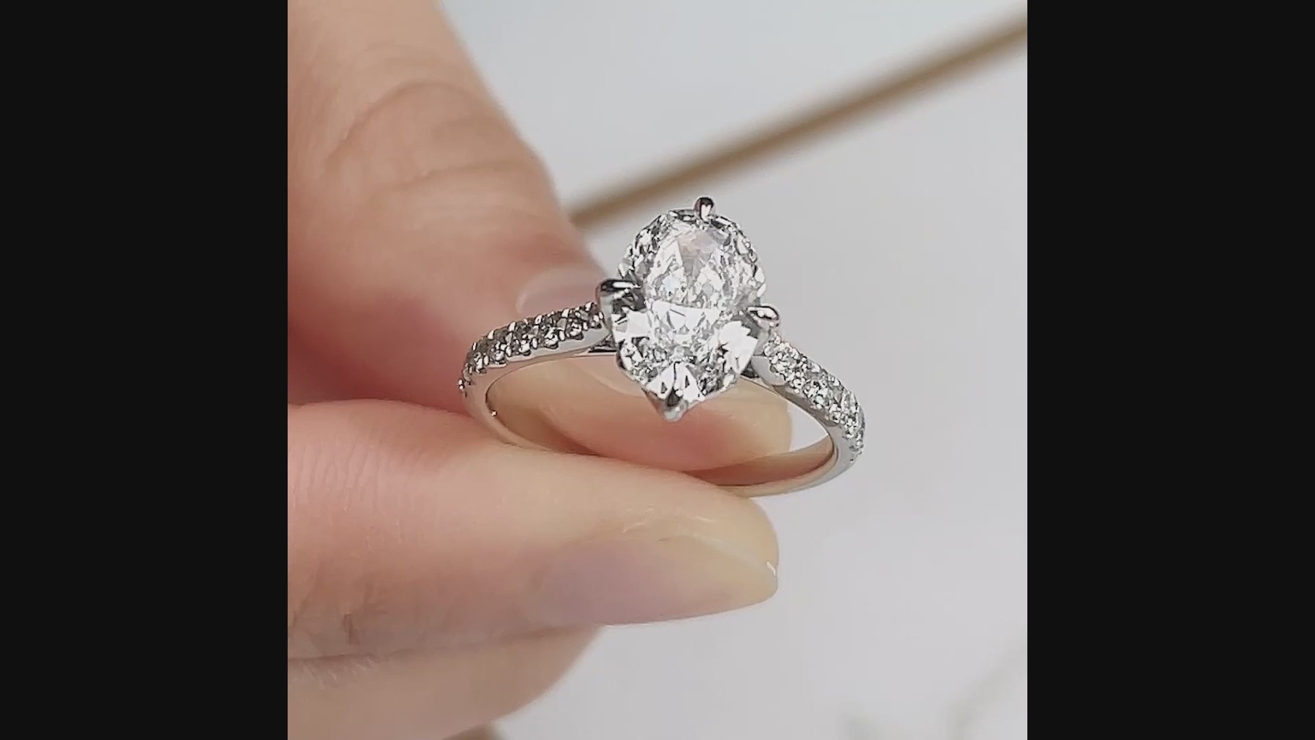 Oval Solitaire With Pave Band (2 CT)