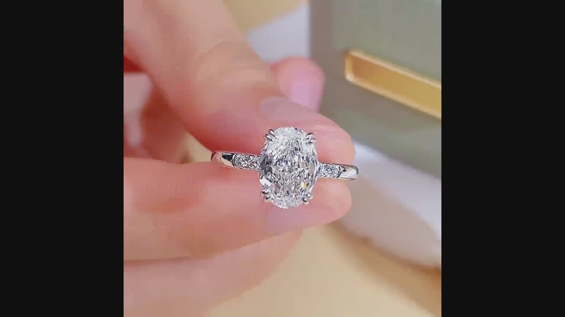 Hidden Halo Oval Solitaire With Cluster Side Stones (2 CT)